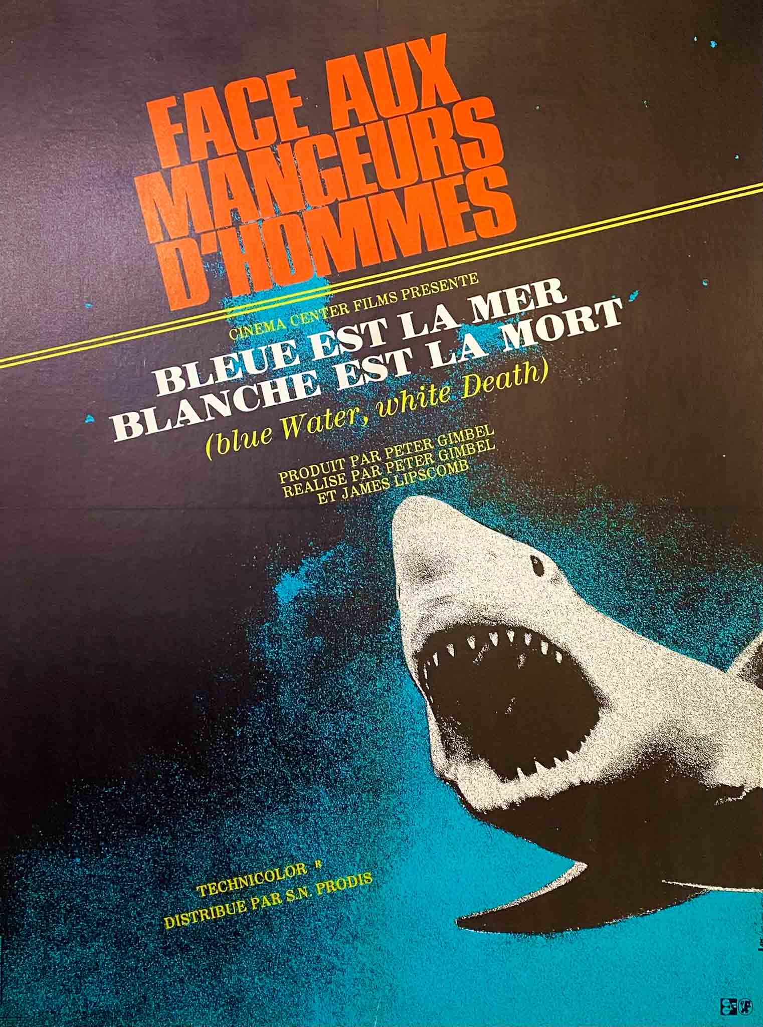 Affiche du film "Face aux Mangeurs d’Hommes" de 1971, avec un requin menaçant sur fond noir et bleu.